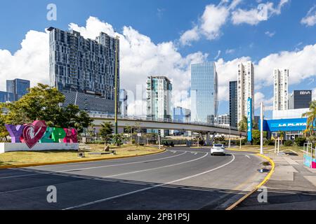 Zapopan, Jalisco Mexico. January 1, 2023. Avenida Acueducto with light traffic with only one car driving, vehicular bridge and modern buildings in bac Stock Photo