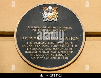 Red plaque on the Liverpool Road Station building, Castlefield, Manchester, England, UK.  Now the Museum of Science & Industry. Stock Photo