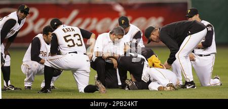 Pittsburgh Pirates shortstop Jack Wilson, left, watches as St. Louis  Cardinals' Albert Pujols trots past after hitting a fourth-inning solo  homer off Pittsburgh Pirates starter Oliver Perez during MLB baseball  action in