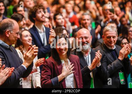 Rome, Italy. 12th Mar, 2023. Elly Schlein, center, flanked by outgoing secretary Enrico Letta, left, and Stefano Bonaccini, applauds during the center-left Democratic Party National Assembly after being proclamated as new secretary in Rome, Italy, March 12, 2023. Credit: Riccardo De Luca - Update Images/Alamy Live News Stock Photo