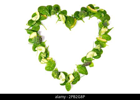 Heart Shape green Detox Salad and Vegetables isolated on white Background Stock Photo