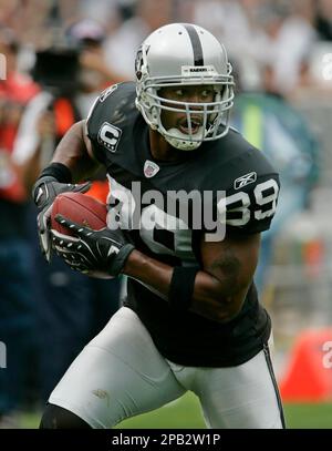 Oakland Raiders wide receiver Ronald Curry runs a play while playing  quarterback against the Denver Broncos during the second quarter at Invesco  Field at Mile High in Denver on November 23, 2008. (
