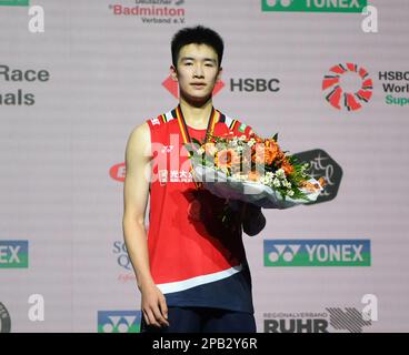 Muelheim, Germany. 12th Mar, 2023. Li Shifeng reacts during the medal ceremony for the men's singles final match between Li Shifeng of China and Ng Ka Long Angus of China's Hong Kong at the Yonex German Open 2023 badminton tournament in Muelheim, Germany, March 12, 2023. Credit: Ren Pengfei/Xinhua/Alamy Live News Stock Photo