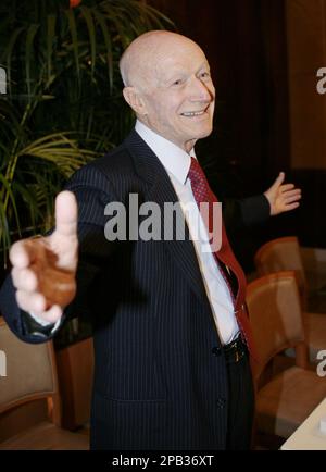 Italian founder and chairman of Esselunga supermarket chain Bernardo  Caprotti shows his new book 'Falce e carrello' during a news conference, in  Milan, Italy, Friday, Sept.21, 2007. (AP Photo/Luca Bruno Stock Photo 