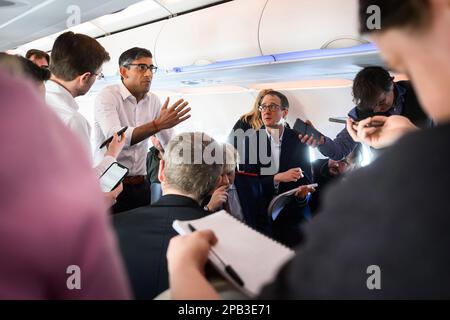 Prime Minister Anthony Albanese with members of the rock band ...