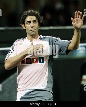Benfica's midfielder Manuel Rui Costa of Portugal waves to AC Milan supporters during a Champions League, Group D soccer match between AC Milan and Benfica at the San Siro stadium ,in Milan, Italy, Tuesday, Sept.18, 2007. AC Milan won 2-1. (AP Photo/Luca Bruno)