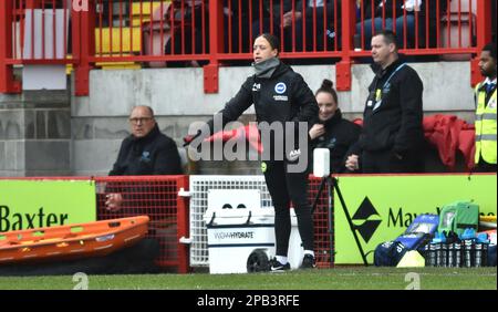 Crawley UK 12th March 2023 - Brighton assistant manager Amy Merricks during the Barclays Women's Super League match between Brighton & Hove Albion and Manchester City   : Credit Simon Dack /TPI/ Alamy Live News Stock Photo