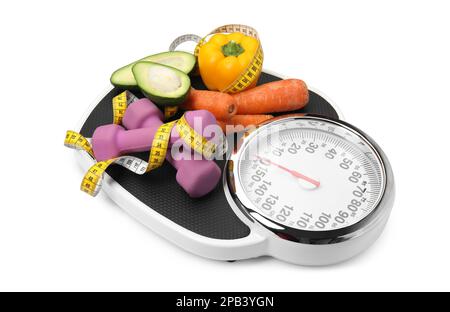 Scales, healthy food, dumbbells and measuring tape on white background Stock Photo