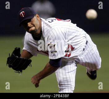 Minnesota Twins pitcher Johan Santana watches a sixth inning pitch on his  way to his sixth win as the Twins beat the Milwaukee Brewers 6-3 Friday,  June 25, 2004 in Minneapolis. (AP