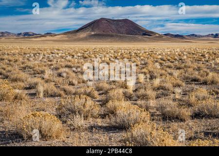 Easy Chair Crater in distance, sagebrush steppe, Great Basin Desert, Lunar Crater National Natural Landmark, Nevada, USA Stock Photo