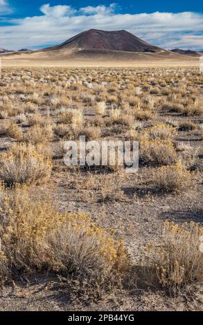 Easy Chair Crater in distance, sagebrush steppe, Great Basin Desert, Lunar Crater National Natural Landmark, Nevada, USA Stock Photo