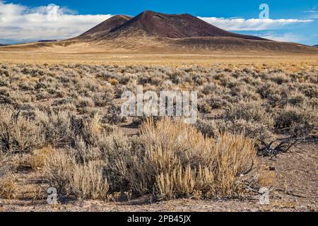 Easy Chair Crater in distance, sagebrush steppe, Great Basin Desert, Lunar Crater National Natural Landmark, Nevada, USA Stock Photo