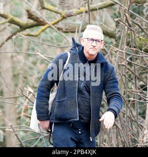 Barnes, UK. 12th Mar, 2023. Gary Lineker, BBC host of Match of the Day returns home to Barnes West London after walking his dog. Credit: Prixpics/Alamy Live News Stock Photo