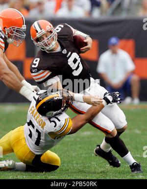 ADVANCE FOR SUNDAY, OCT. 8 ** FILE ** Cleveland Browns quarterback Charlie  Frye (9) is sacked for a 10-yard loss by Baltimore Ravens' Trevor Pryce in  the first quarter of an