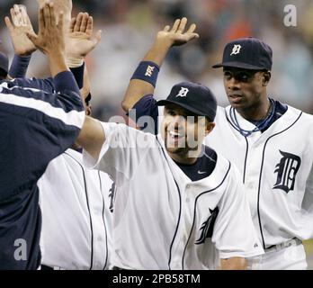 Curtis Granderson #28 of the Detroit Tigers walks to the dugout