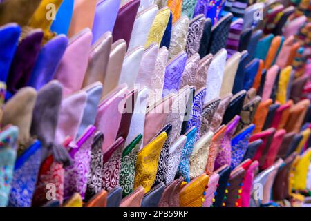 Colorful Babouche slippers - Traditional Moroccan footwear at the bazaar in Marocco Stock Photo