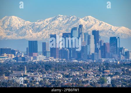 Los Angeles with snow covered mountains Stock Photo