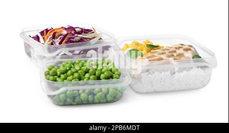 Plastic containers with fresh food on white background Stock Photo