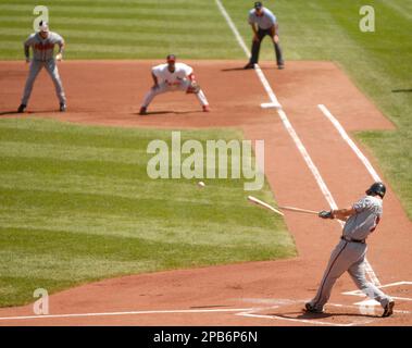 Mark Teixeira of the Atlanta Braves is congratulated by Jeff