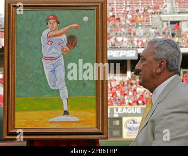 Former Cincinnati Reds shortstop Dave Concepcion wipes away tears during  ceremonies retiring his number prior to the Reds' baseball game against the  Florida Marlins, Saturday, Aug. 25, 2007, in Cincinnati. (AP Photo/David