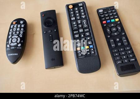 multiple remote controls for tv media box satelite boxes Lanzarote, Canary Islands, Spain Stock Photo