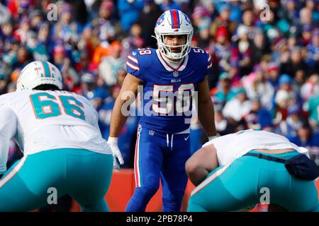 FILE - Buffalo Bills linebacker Matt Milano (58) tackles Kansas City Chiefs  tight end Travis Kelce (87) during the second half of the AFC championship  NFL football game in Kansas City, Mo.