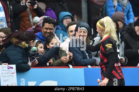 Crawley UK 12th March 2023 -  Chloe Kelly with fans after the Barclays Women's Super League match between Brighton & Hove Albion and Manchester City   : Credit Simon Dack /TPI/ Alamy Live News Stock Photo