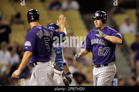 May 31, 2009 - Denver, Colorado, USA - Colorado Rockies coach VINNY CASTILLA,  shortstop TROY TULOWITZKI and third baseman GARRETT ATKINS (left to right)  kid around before a 2-5 loss to the