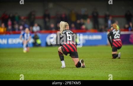 Crawley UK 12th March 2023 - Alex Greenwood of Manchester City takes the knee before the Barclays Women's Super League match between Brighton & Hove Albion and Manchester City   : Credit Simon Dack /TPI/ Alamy Live News Stock Photo