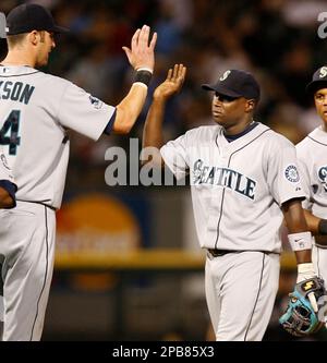 New York Yankees' shortstop Derek Jeter, left, runs down Seattle Mariners'  Yuniesky Betancourt in the sixth inning at Safeco Field in Seattle on May 13,  2007. Betancourt was caught in a pickle