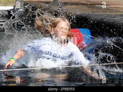 Alyssa Flaten 10 of Chippewa Falls Wis. makes a big splash as