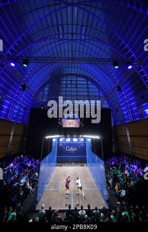 The crowd watch the round one BO3 match between Dimitri Steinmann and Karim Abdel Gawad during the Canary Wharf Squash Classic at the East Wintergarden, London. Picture date: Saturday March 12, 2023. Stock Photo