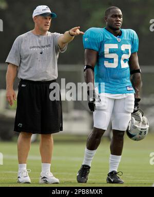 Carolina Panthers linebackers coach Ken Flajole gives instructions to  rookie Jon Beason during Beason's first practice at training camp in  Spartanburg, South Carolina, Monday, August 6, 2007. (Photo by David T.  Foster