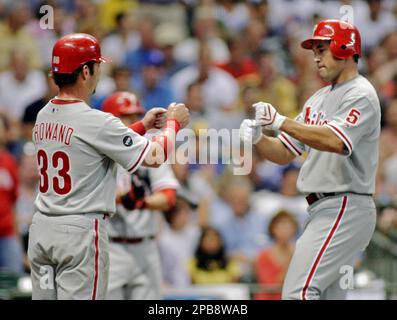 The Philadelphia Phillies Ryan Howard is congratulated by teammate Aaron  Rowand after a three-run home run in the first inning against the New York  Mets on Saturday, August 5, 2006. (Photo by