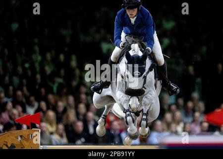 DEN BOSCH - Martin Fuchs (SUI) on Leone Jei in action during the World Cup show jumping, during The Dutch Masters Indoor Brabant Horse Show. ANP SANDER KONING netherlands out - belgium out Stock Photo