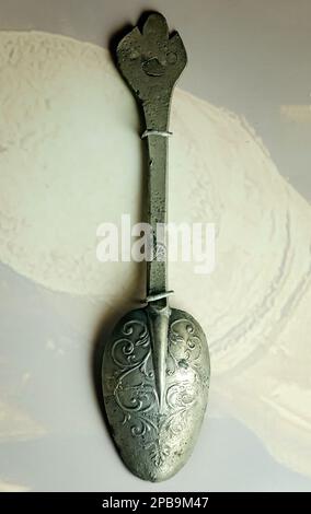 A decorative pewter spoon from the slave ship Henrietta Marie circa 1700 is displayed at GulfQuest Museum in Mobile, Alabama. Stock Photo