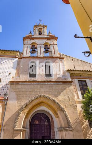 Facade of the Church of Santa Maria la Blanca in old city center of  Seville, Andalusia, Spain. Text HAC EST DOMUS DEI ET PORTA COELI 1741 means THIS Stock Photo