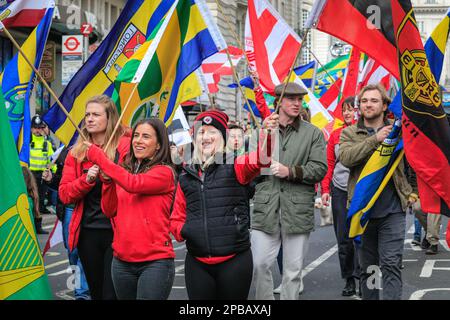 London, UK. 12th Mar, 2023. The annual St Patrick's Day Parade makes its way through central London to celebrate London's Irish community and Irish culture and heritage with participants in costumes, marching bands, pageantry and more, watched by spectators along the route. Credit: Imageplotter/Alamy Live News Stock Photo