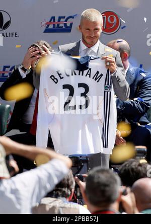 David Beckham holds up his jersey at the official presentation of David  Beckham to the Los Angeles Galaxy at the Home Depot Center in Carson, CA on  July13, 2007. Photo credit: Francis