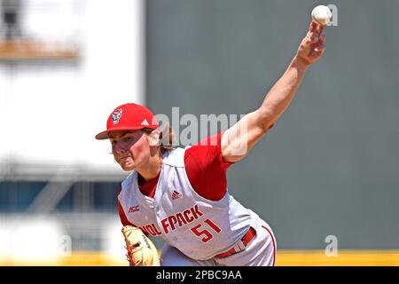 CORAL GABLES, FL - MAR 12: NC State infielder Matt Heavner (32) throws  prior to the game as the Miami Hurricanes faced the NC State Wolfpack on  March 12, 2023, at Mark