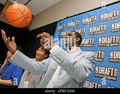 Ohio State's Greg Oden, the NBA Draft's likely top pick demonstrates  holding a basketball with his really dry hands during a news conference,  Wednesday, June 27, 2007 in New York. The NBA