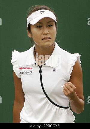 Japan's Akiko Morigami reacts as she plays Italy's Alberta Brianti during a Women's Singles match at Wimbledon, Wednesday June 27, 2007. (AP Photo/Kirsty Wigglesworth) ** EDITORIAL USE ONLY **