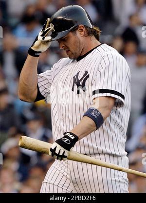 Former New York Yankee Jason Giambi talks to reporters during Old