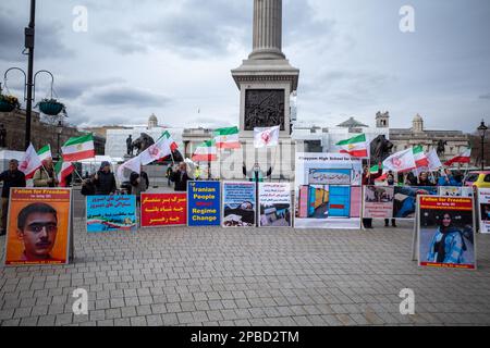 Iranians hold protest rally in Trafalgar Square to express solidarity with the nationwide Iranian uprising against the mullahs’ regime. 11th March 23. Stock Photo