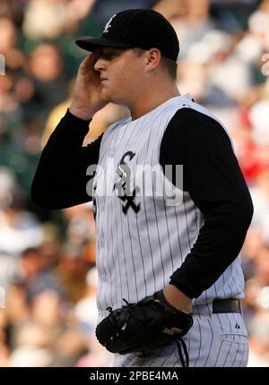Chicago White Sox pitcher Bobby Jenks walks to the dugout after