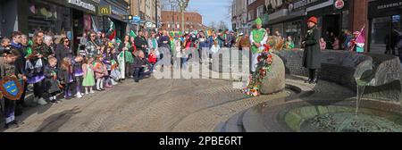 St Patricks Day parade 2023 by the local Irish Community, Bridge Street Warrington, Cheshire, England, UK, WA1 to the IRA bombing memorial Stock Photo