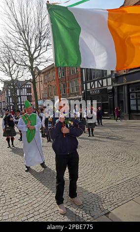 St Patricks Day parade 2023 by the local Irish Community, Bridge Street Warrington, Cheshire, England, UK, WA1 to the IRA bombing memorial Stock Photo