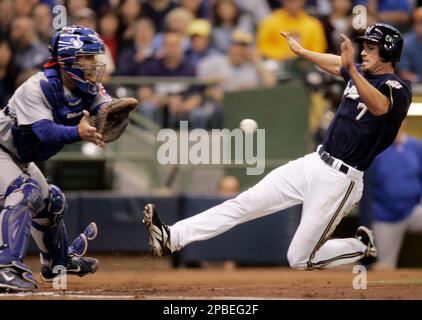 Milwaukee Brewers' J.J. Hardy slides home during the fourth inning of a  baseball game Thursday, May 14, 2009, in Milwaukee. (AP Photo/Morry Gash  Stock Photo - Alamy