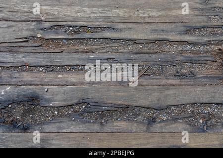 Old wood textured background from worn bridge decking for graphic resource newsletter advertising magazine backdrop design Stock Photo