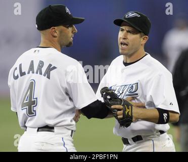 Toronto Blue Jays' Howie Clark is forced out at second base as Boston Red  Sox's Mark Bellhorn fires to first but misses the double play in first  inning action at the SkyDome